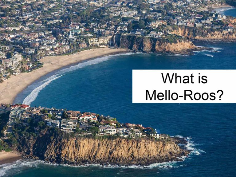 image of beach community with home, sand and ocean