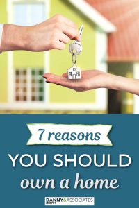 pinnable image with hands holding house keys and text saying 7 Reasons to Own A Home