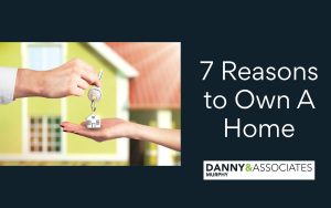 7 Reasons to Own A Home text and image of hands holding keys