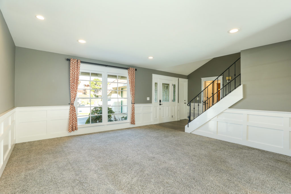 remodeled living room with wainscoting