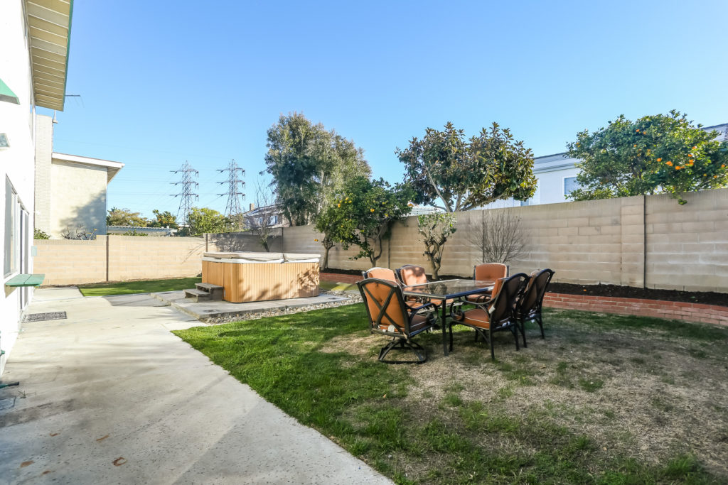 outside with above ground hot tub