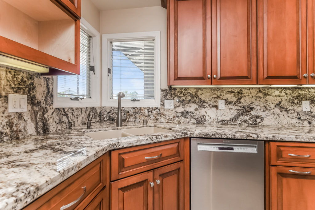 Welcome to your new beach close, interior tract home in this quiet and established neighborhood.  With all 4 bedrooms downstairs, the home lives like a single story and offers a comfortable and open floor plan with an abundance of natural light.