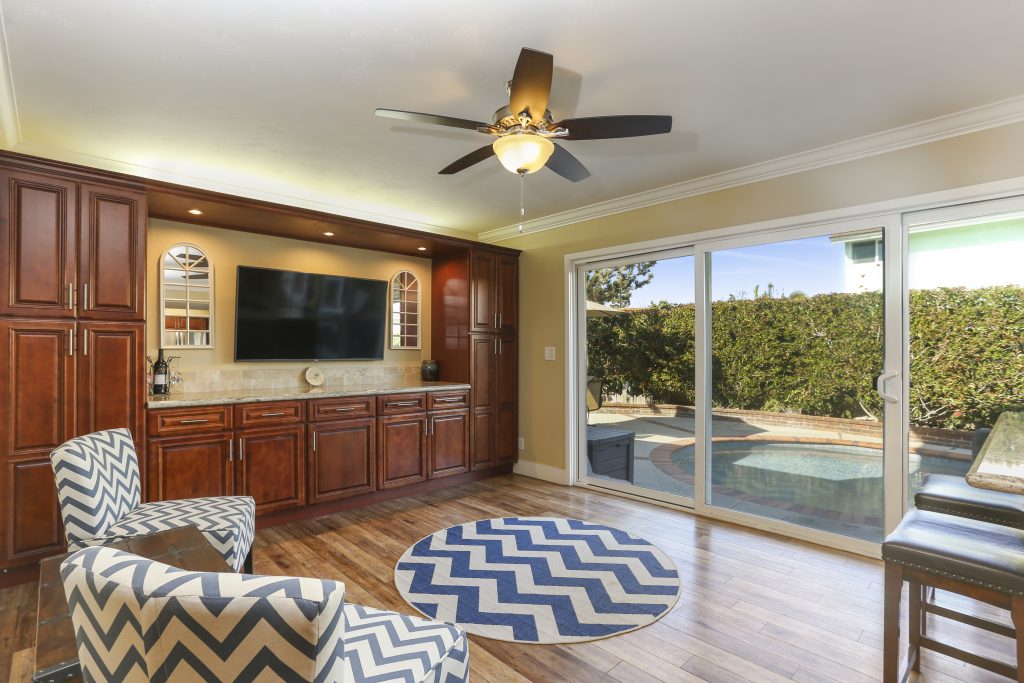 8121 Dartmoor Drive, Huntington Beach has a large pool and is in a highly desirable neighborhood close to the park and school!