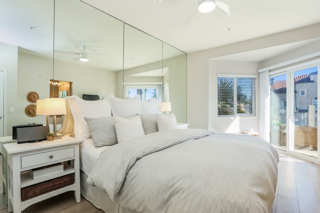 2000 Pacific Coast Highway #102, Huntington Beach is a beautifully remodeled beachfront condo with peak-a-boo ocean views featuring 2 beds / 2 1/2 baths!