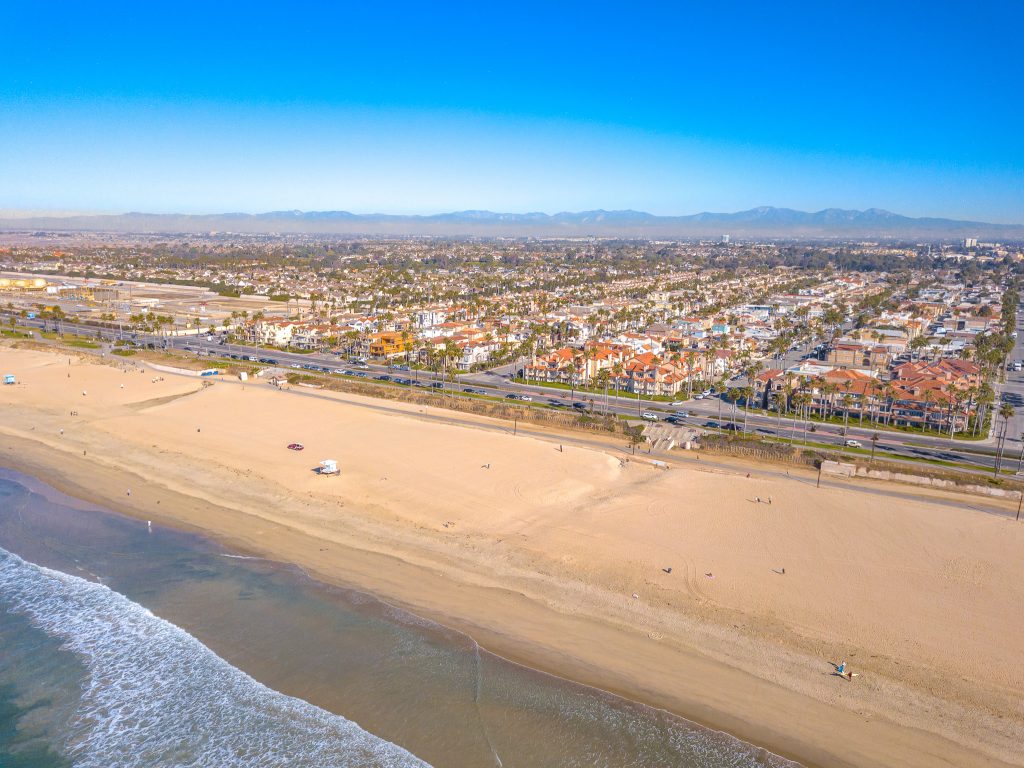 2000 Pacific Coast Highway #102, Huntington Beach is a beautifully remodeled beachfront condo with peak-a-boo ocean views featuring 2 beds / 2 1/2 baths!