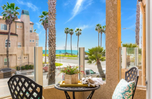 2000 Pacific Coast Highway #102, Huntington Beach is a beautifully remodeled beachfront condo with peak-a-boo ocean views featuring 2 beds / 2 1/2 baths!