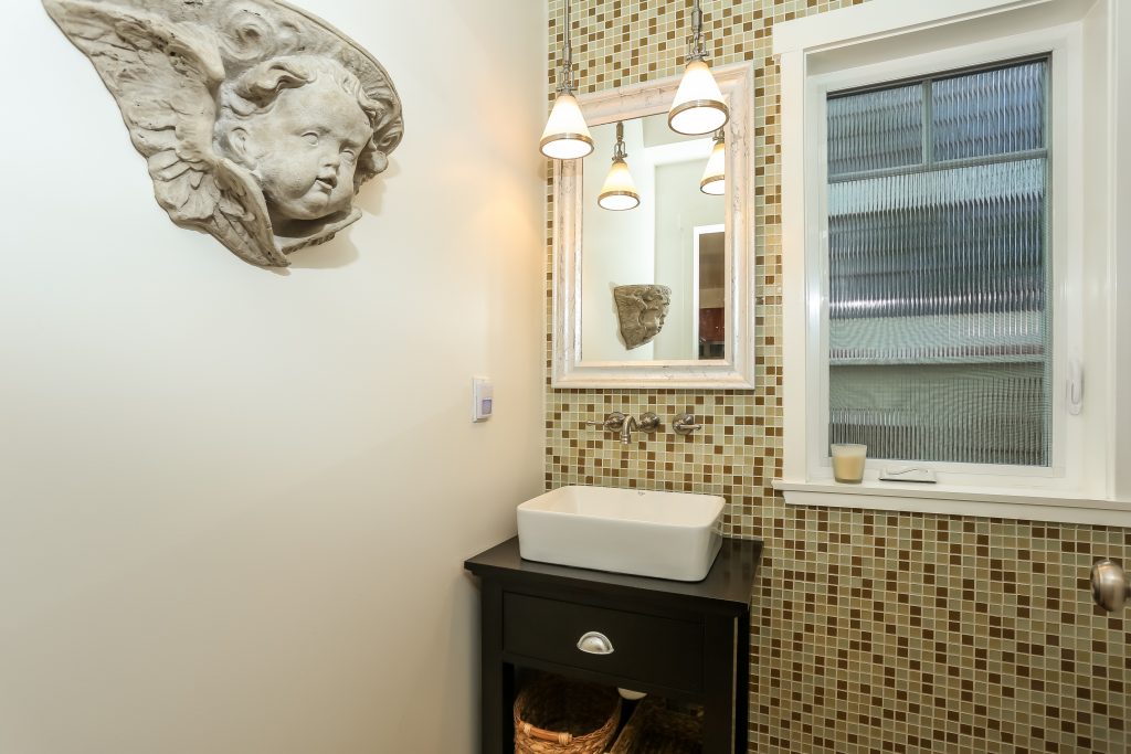 costa mesa bathroom with vessel sink and tile accent all