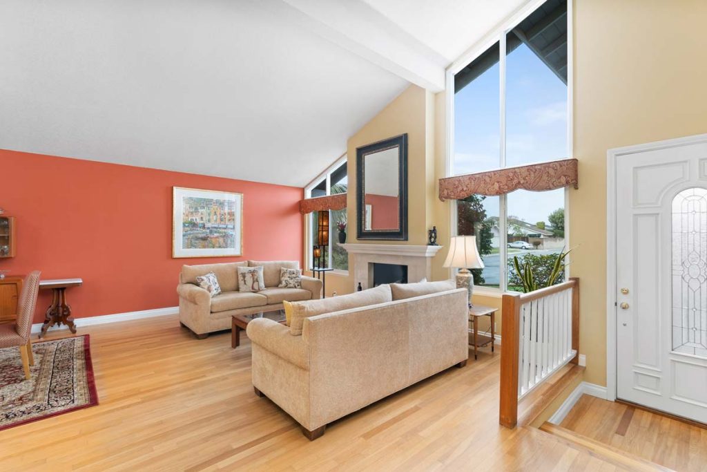 entry with family room and vaulted ceilings