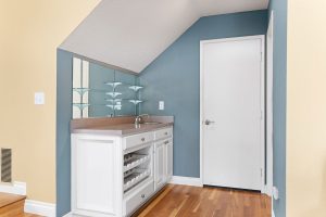 wet bar and door with access to garage