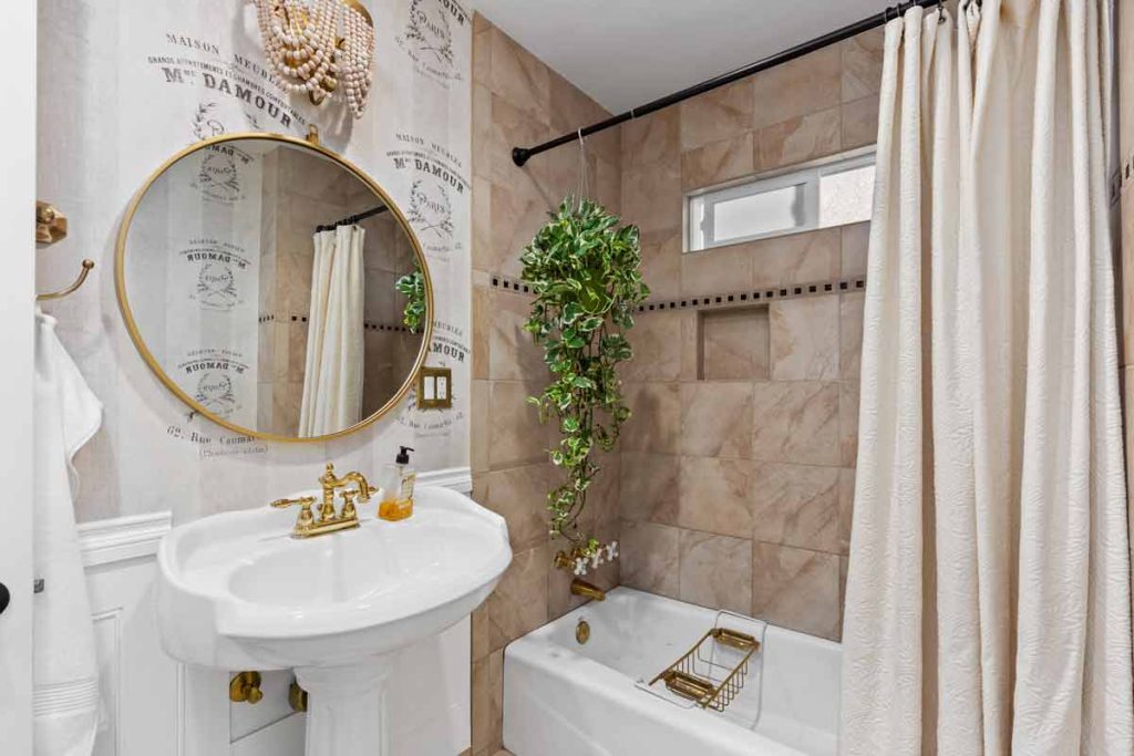 bathroom with tub and sink