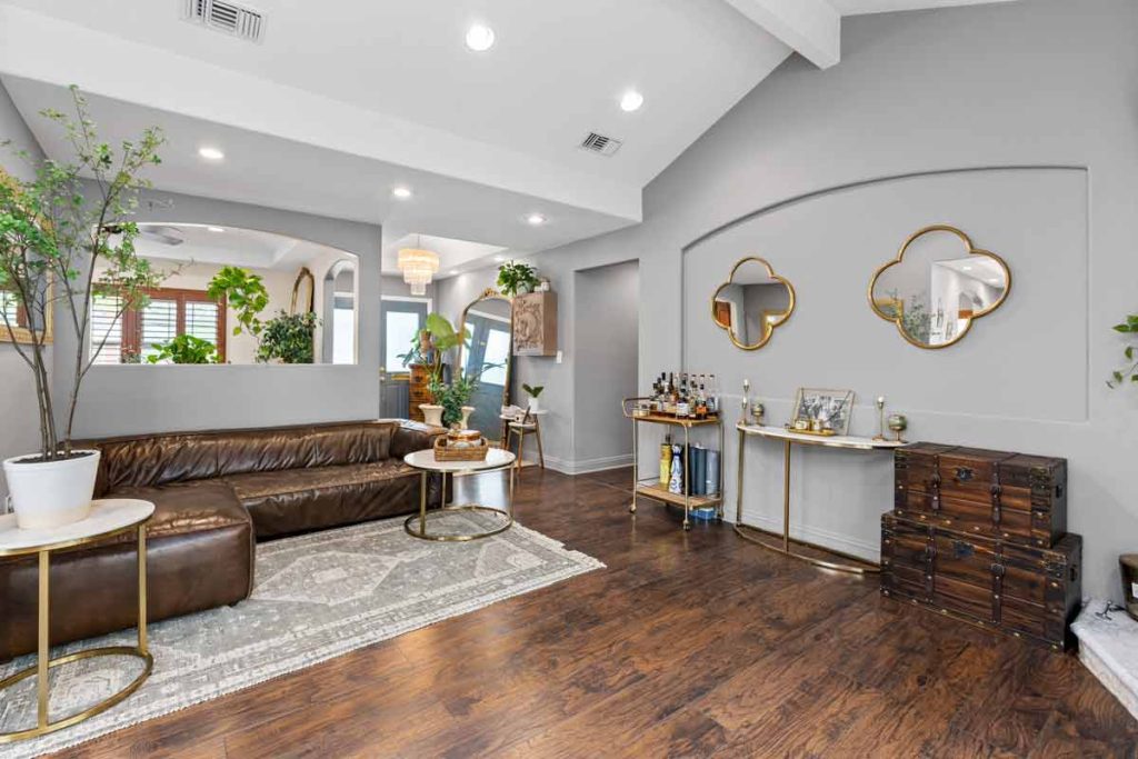 living room with couch and bar cart