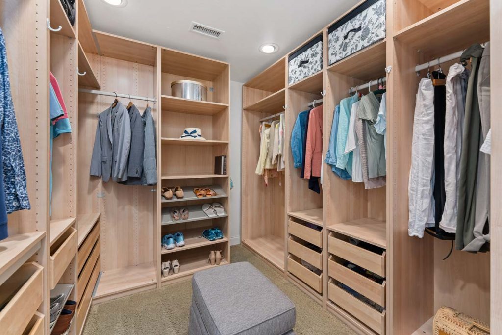 walk-in master closet with built-ins at 8581 Bayonne Drive, Huntington Beach