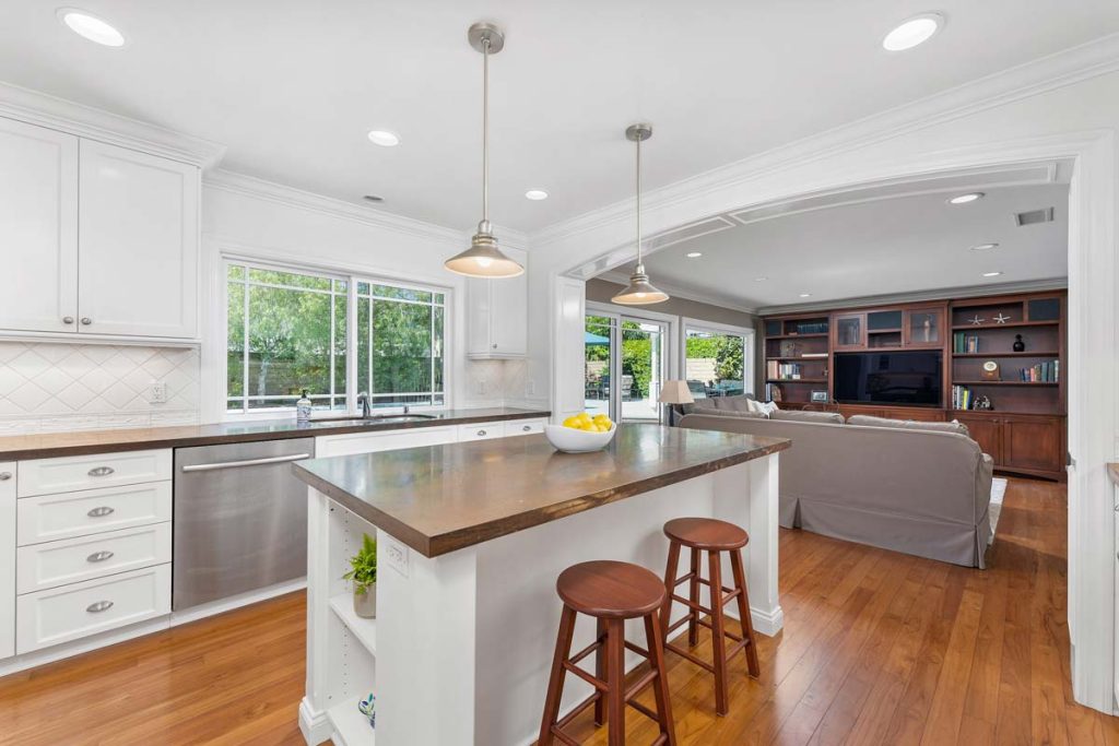 kitchen wit island and window overlooking backyard