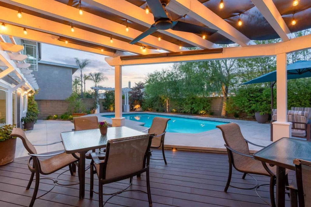 twilight in the backyard under the pergola at 8581 Bayonne Drive, Huntington Beach