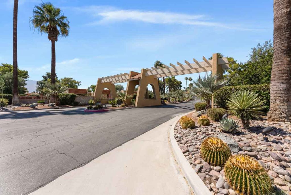 image of entry to community with desert landscape