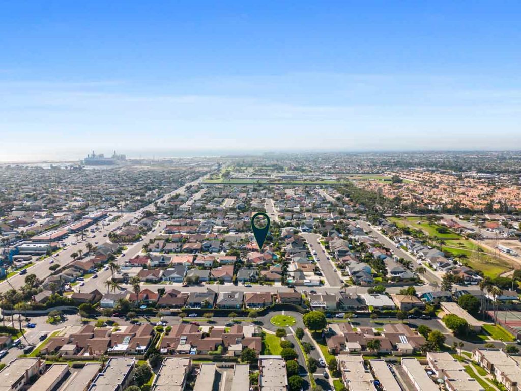 aerial view with arrows pointing to house at 21372 Pensacola Circle, Huntington Beach