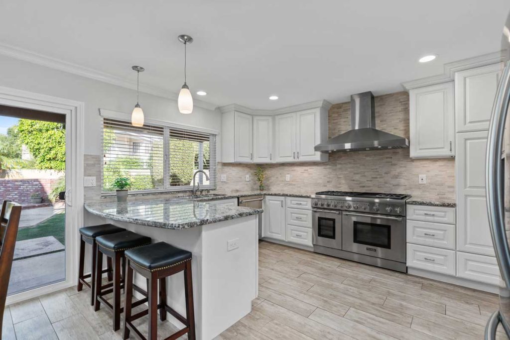 kitchen at 21372 Pensacola Circle, Huntington Beach with granite counters