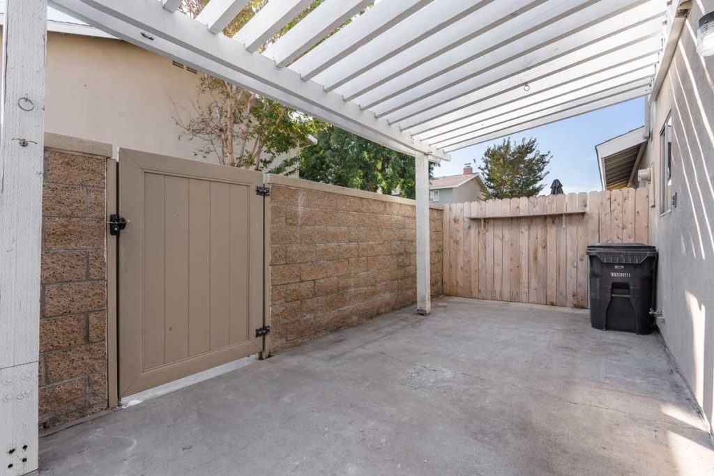 small fenced in patio space