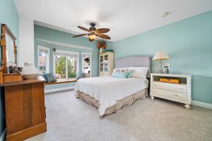 master bedroom with bed and ceiling fan