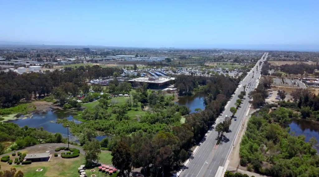 aerial view of park, pond and library