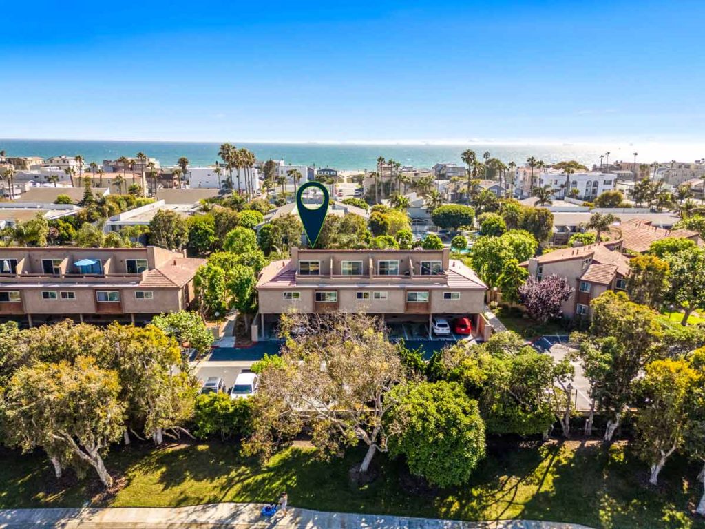 aerial view with arrow pointing to 16883 Bluewater Lane #27, Huntington Beach