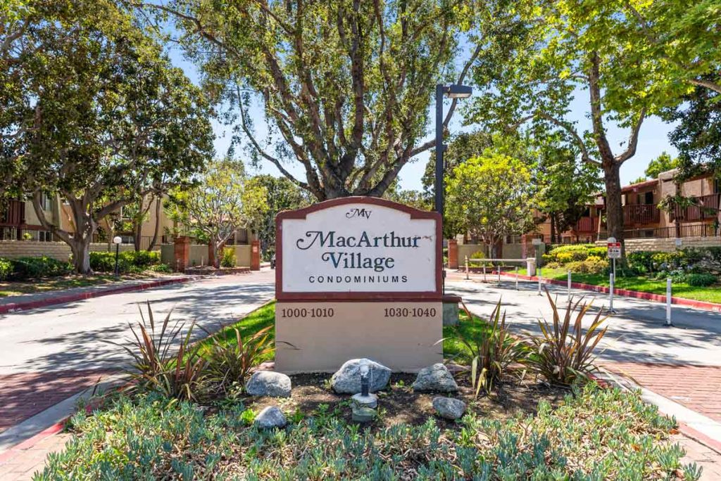 entry sign of community saying MacArthur Village