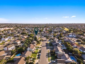 aerial view of home for sale in fountain valley with arrow pointing to house