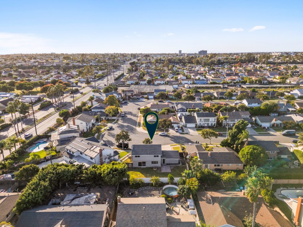 aerial view of home for sale in fountain valley with arrow pointing to house