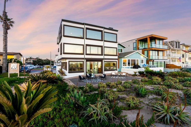 twilight image of beachfront home's exterior