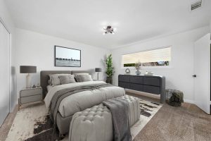 staged master bedroom of 6371 Athena Drive, Huntington Beach