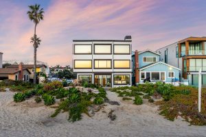 twilight image of beachfront home's exterior