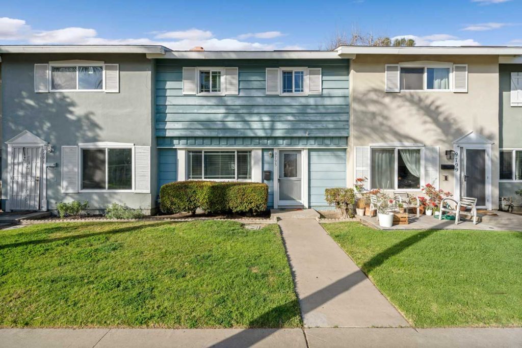 exterior of 9795 Continental Drive, Huntington Beach showing light blue siding with white trim