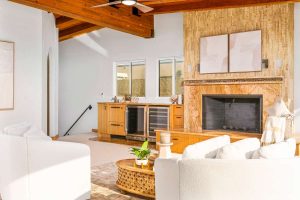 upstairs room with wet bar and fireplace