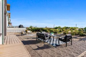 beachfront patio with dining set