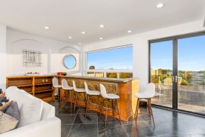 bar area with beach and ocean view