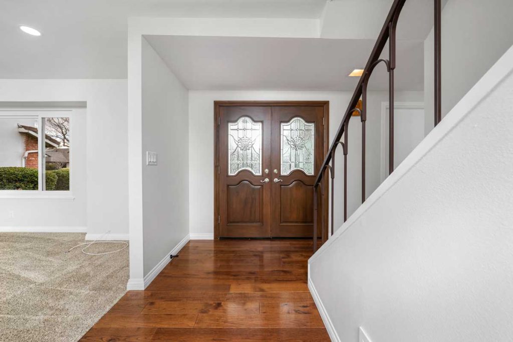 inside entry of home showing double doors