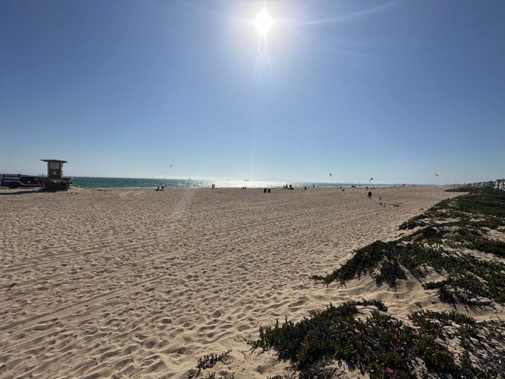 blue skies and ocean views with sand