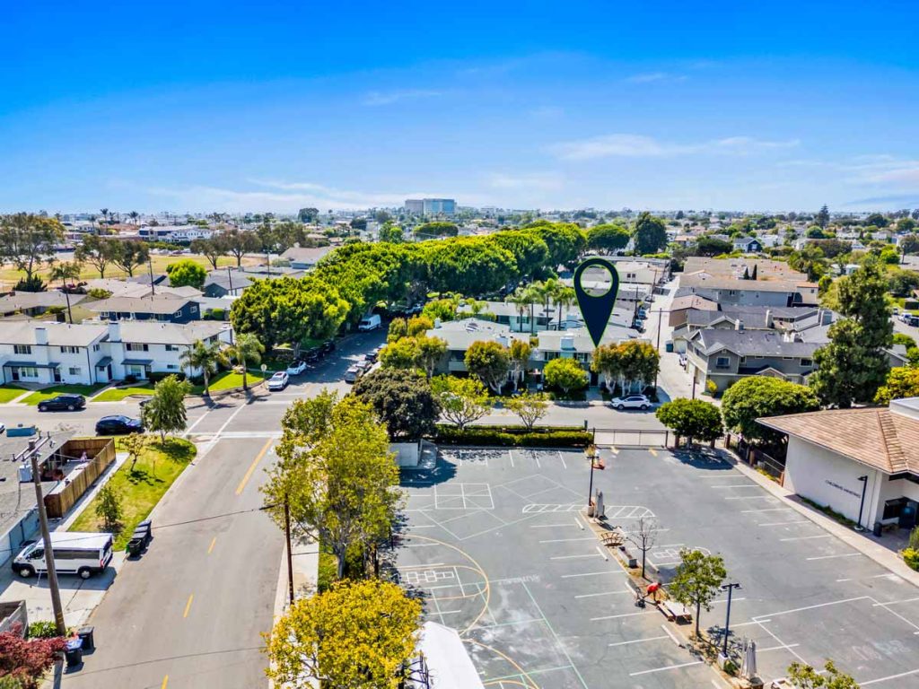 aerial view of newport beach neighborhood with arrow pointing to home for sale