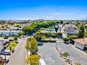 aerial view of newport beach neighborhood with arrow pointing to home for sale