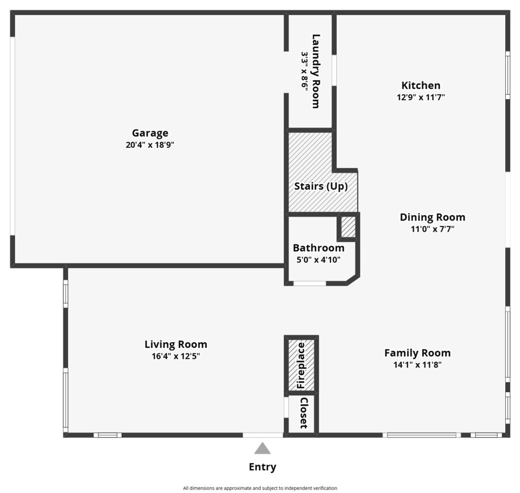 first level floor plan showing garage, kitchen family room dining room and living room