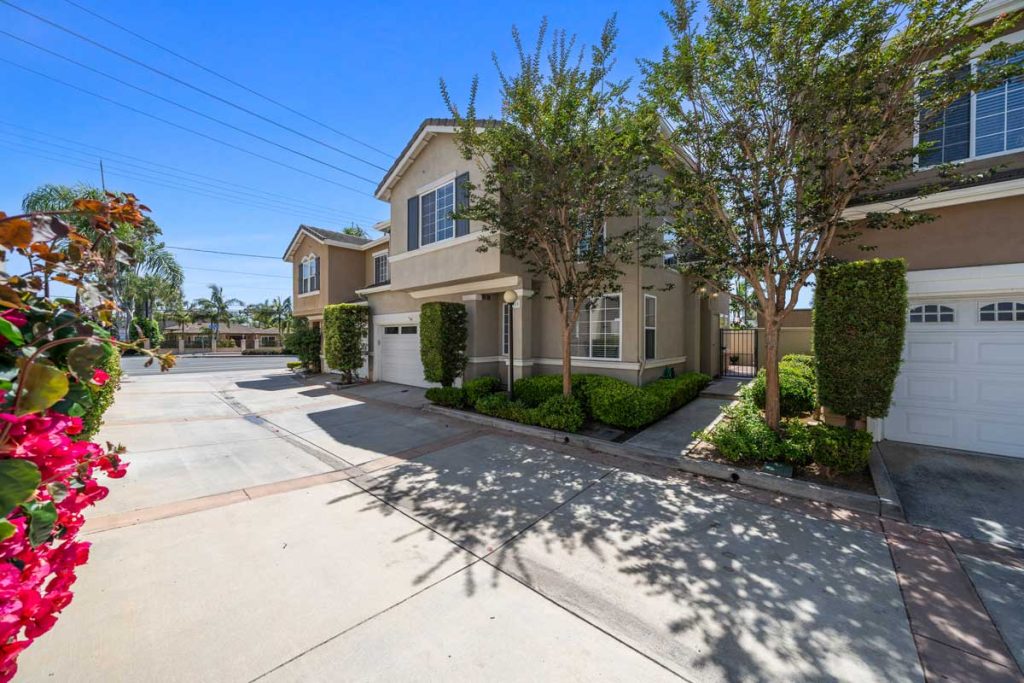 shared driveway and exterior of home for sale