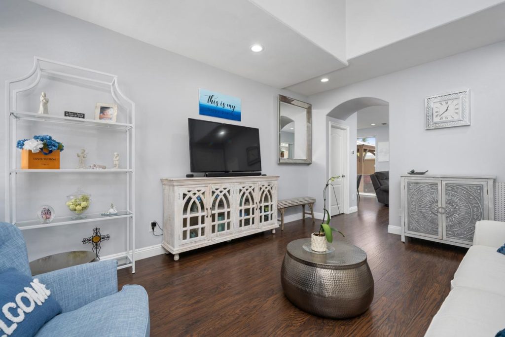 living room with couches and entertainment center