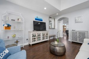 living room with couches and entertainment center