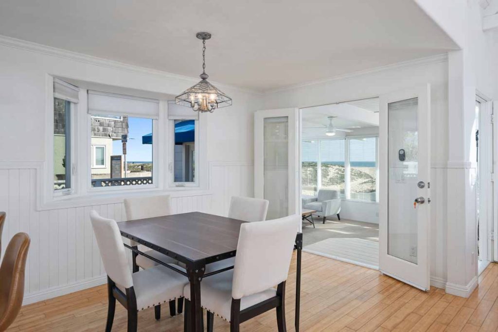 dining area with doors leading out to patio