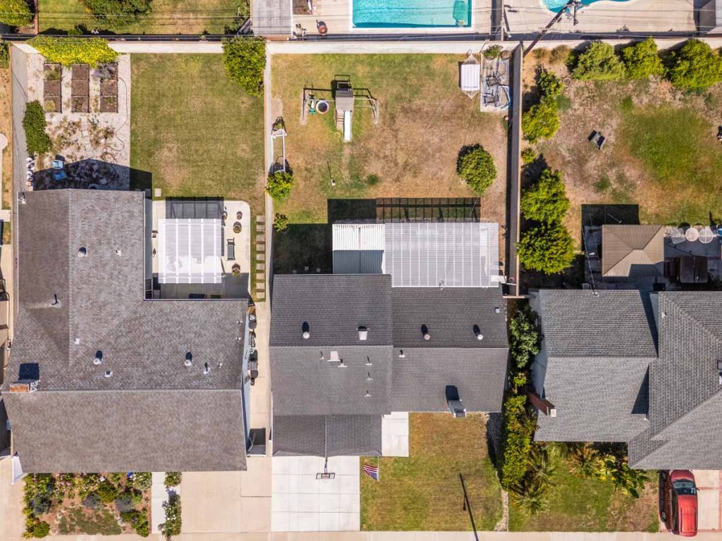 aerial view of home showing front and backyard