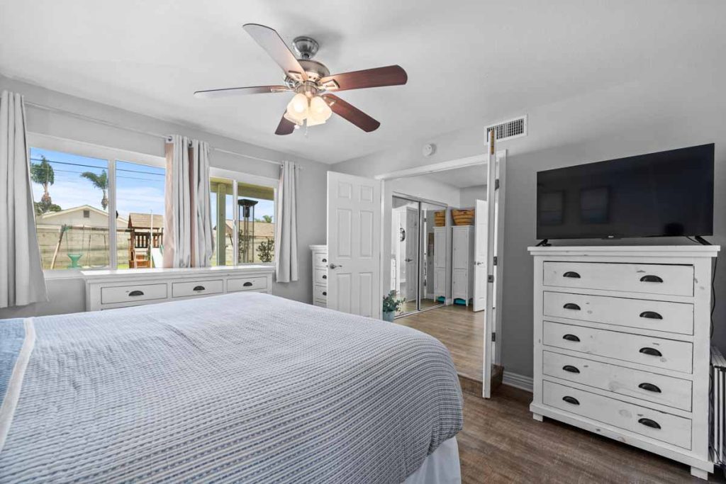 master bedroom on first floor with view of backyard
