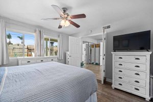 master bedroom on first floor with view of backyard