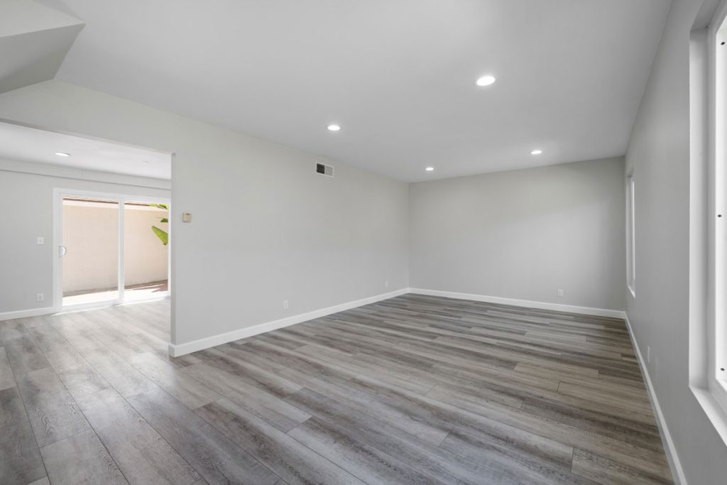 empty interior entry with neutral colors and recessed lights