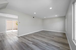 empty interior entry with neutral colors and recessed lights