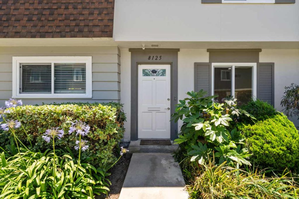 exterior entry showing white front door